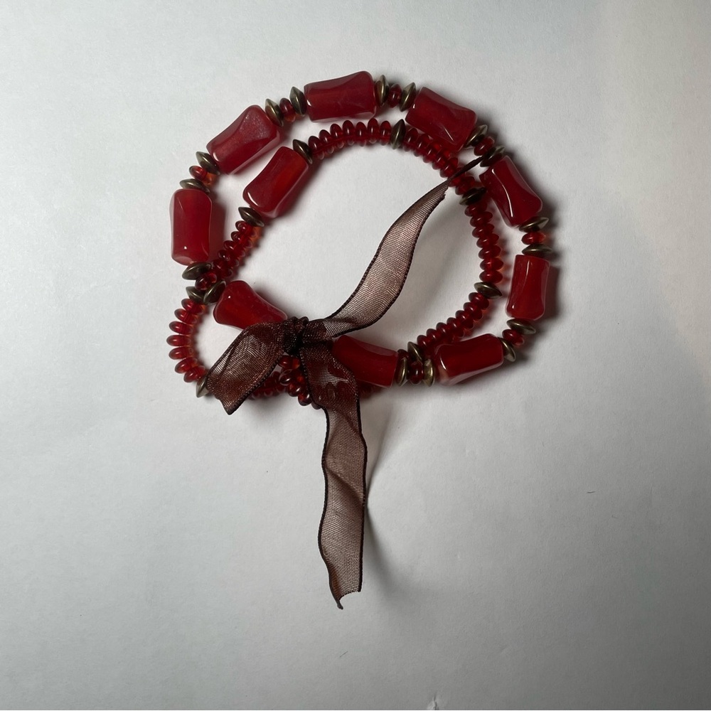 Chic Red Beaded Bracelet with Ribbon Accent